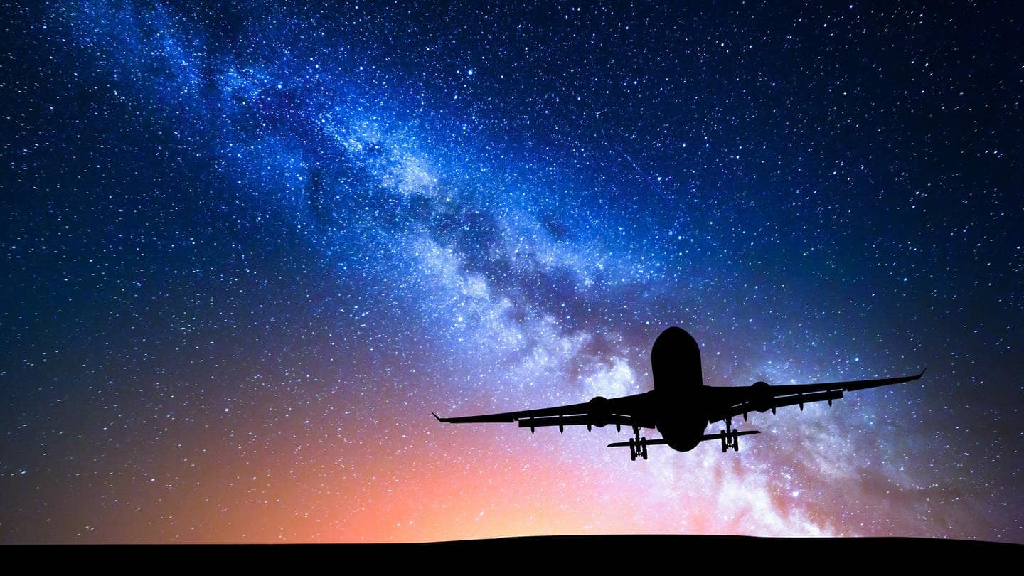 Flugzeug vor dem Sternenhimmel