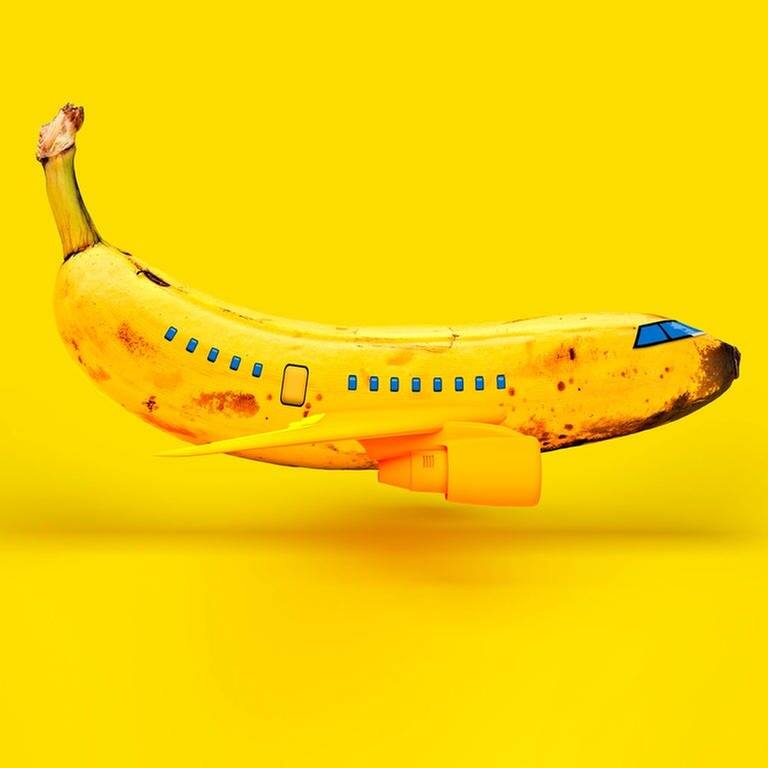 Flugzeug dargestellt als Banane (Foto: IMAGO, IMAGO / Westend61)