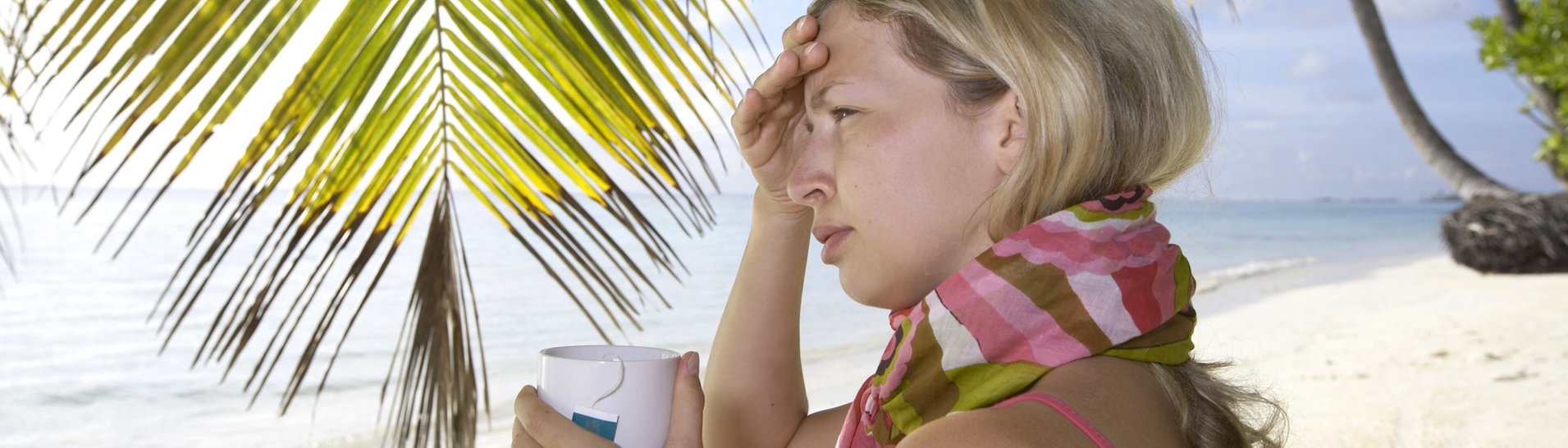 Krank im Urlaub (Foto: Adobe Stock / epixproductions)