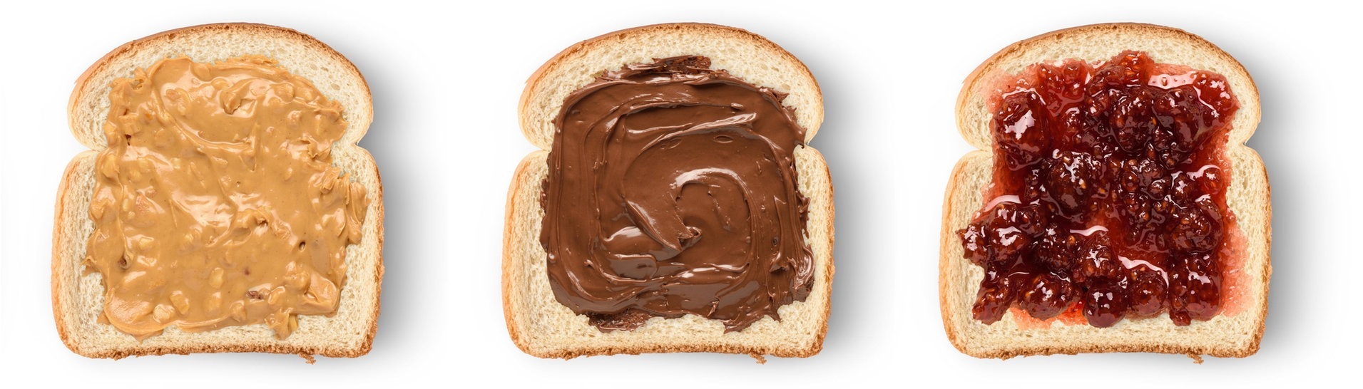 Toasts mit Nuss-Nougat-Creme, Erdnussbutter und Marmelade (Foto: Adobe Stock/chones)