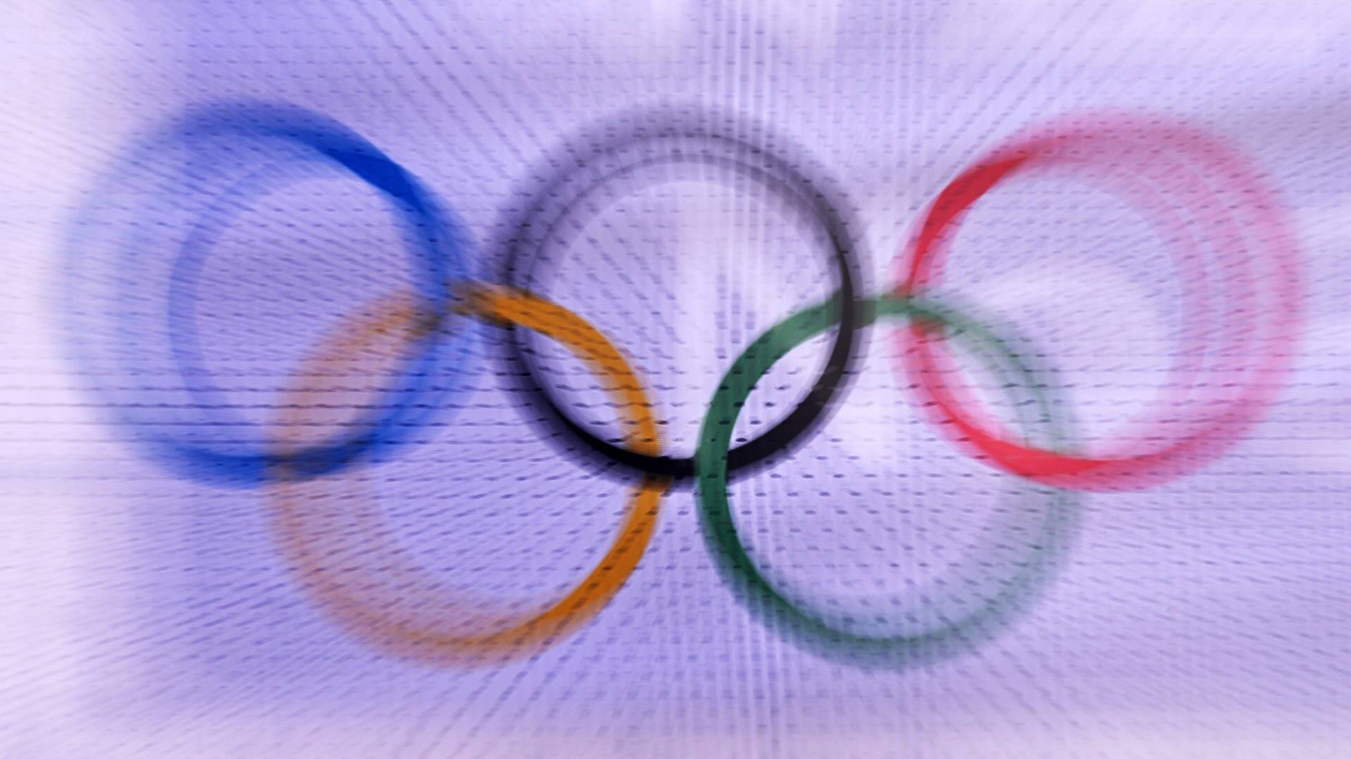 Zoom-Effekt: Die Olympischen Ringe auf einem weißen Hintergrund (Foto: dpa Bildfunk, picture alliance/dpa | Peter Kneffel)