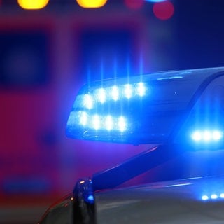 Symbolbild: Blaulicht auf einem Polizeiauto