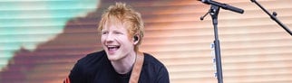 Ed Sheeran singt bei einem Konzert mit seiner Gitarre. Bald könnte es ein Duett mit Fan Ellie Banke geben.