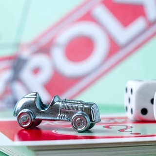 Spielfigur zum Gewinnen des Brettspiels Monopoly mit diesen Tricks
