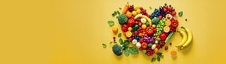 Obst und Gemüse in Herzform ausgelegt. Symbolbild für den Unterschied zwischen Obst und Gemüse.