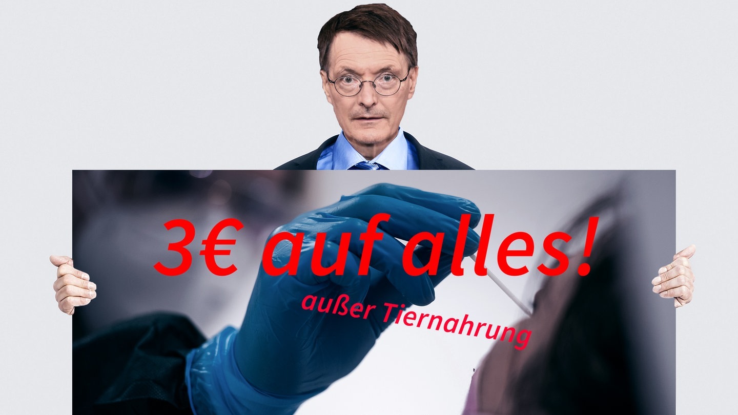 Foto: picture-alliance / Reportdienste, picture-alliance Lauterbach wirbt mit Schild für 3 Euro auf alles (Foto: picture-alliance / Reportdienste, picture-alliance)