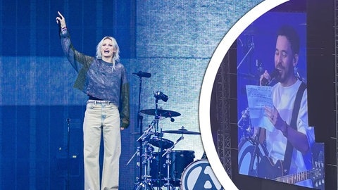 Emily Armstrong und Mike Shinoda von Linkin Park performen bei ihrem Konzert in Hannover auf der Bühne und sprechen Deutsch.