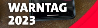 Alarm am bundesweiten Warntag: eine rote Meldung erscheint auf dem Handy.