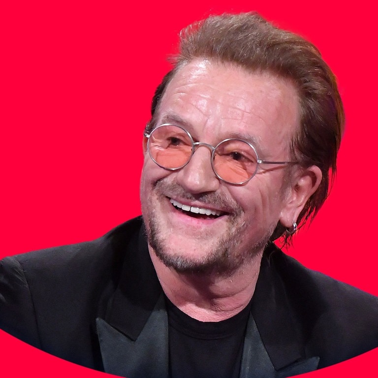 Bono, der Sänger der Rock-Band U2, trägt eine rötliche Brille. (Foto: picture-alliance / Reportdienste, Picture Alliance)