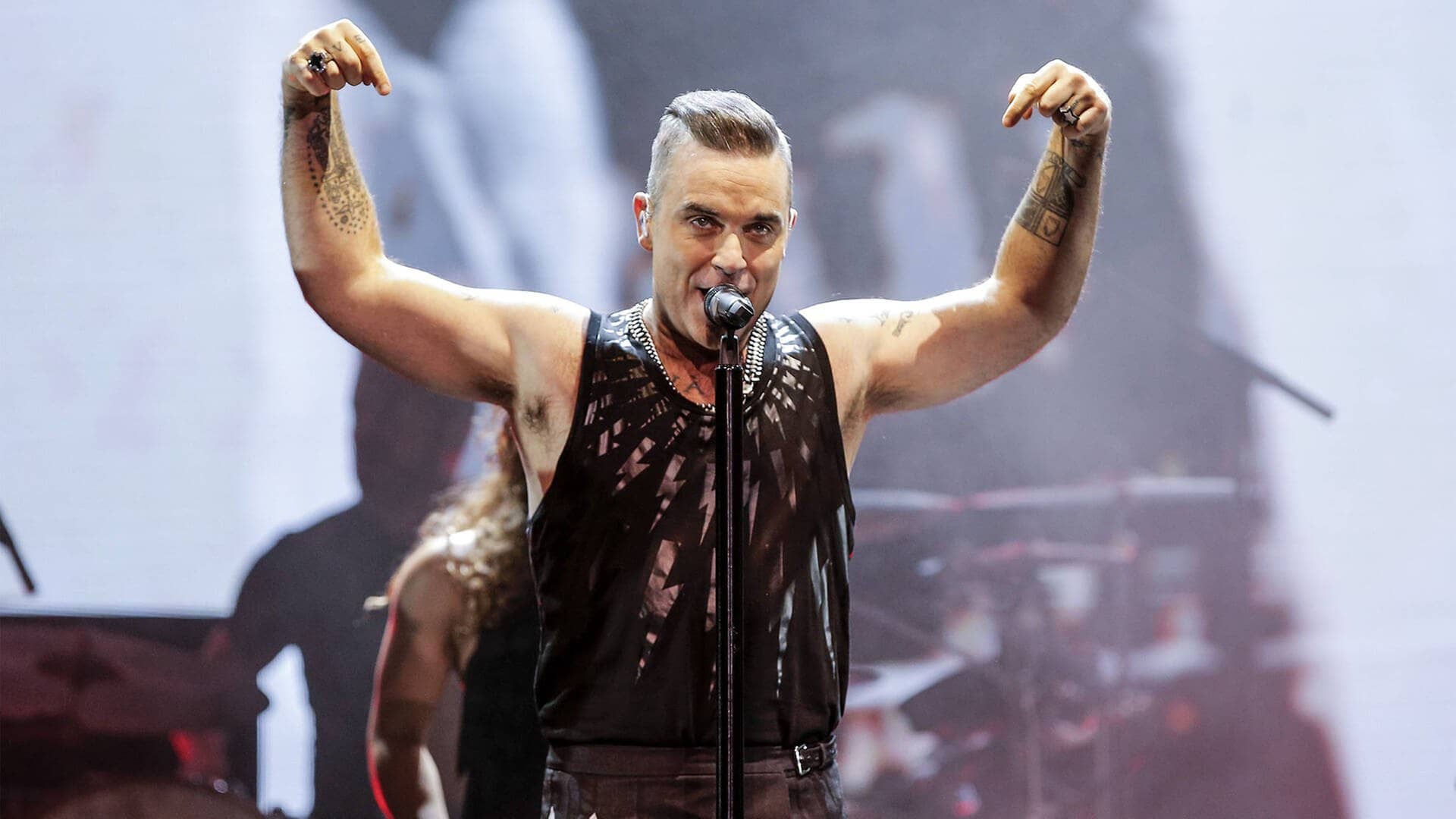 Robbie Williams singend (Foto: imago/Aton Chile)