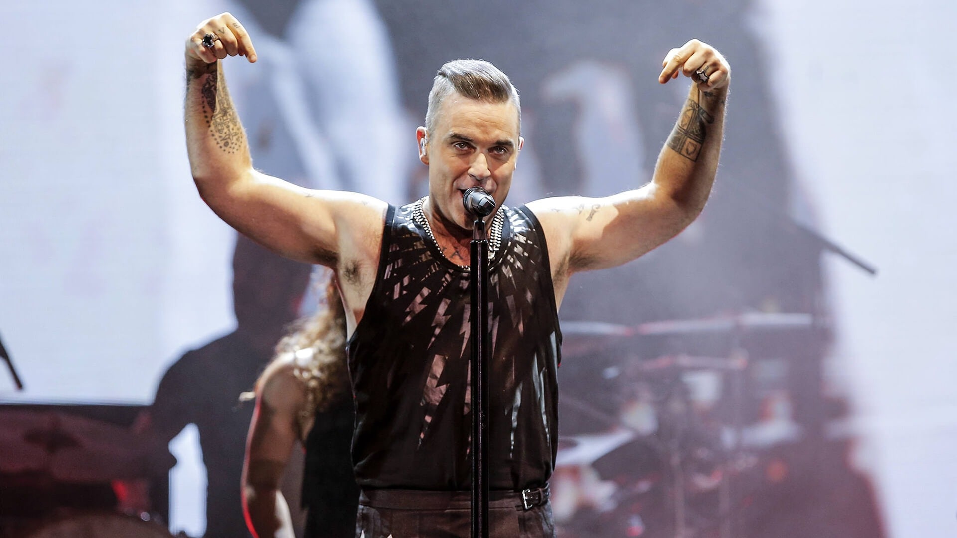Foto: imago/Aton Chile Robbie Williams singend (Foto: imago/Aton Chile)