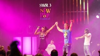 Star-DJ David Guetta bei seinem Auftritt in Baden-Baden mit Kelly Rowland. (Foto: SWR3) Star-DJ David Guetta bei seinem Auftritt in Baden-Baden mit Kelly Rowland.