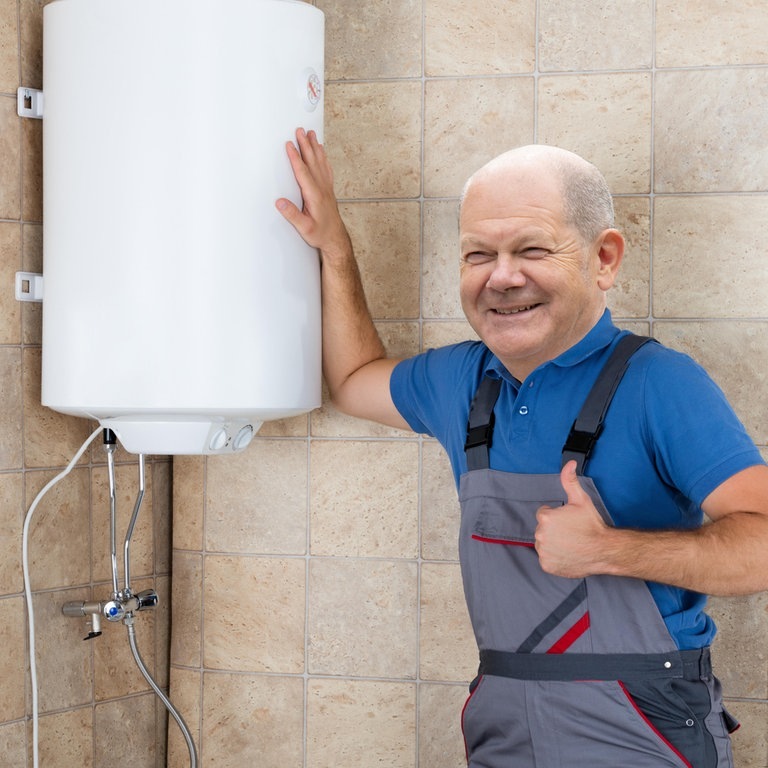 Olaf Scholz: Ich bin Klempner von Beruf (Foto: picture-alliance / Reportdienste, Andriy Popov)