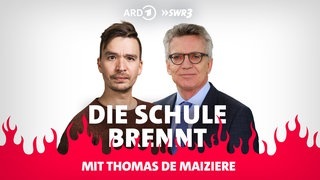 Thomas de Maizière und Bob Blume vor Flammen (Foto: SWR3) Thomas de Maizière und Bob Blume vor Flammen