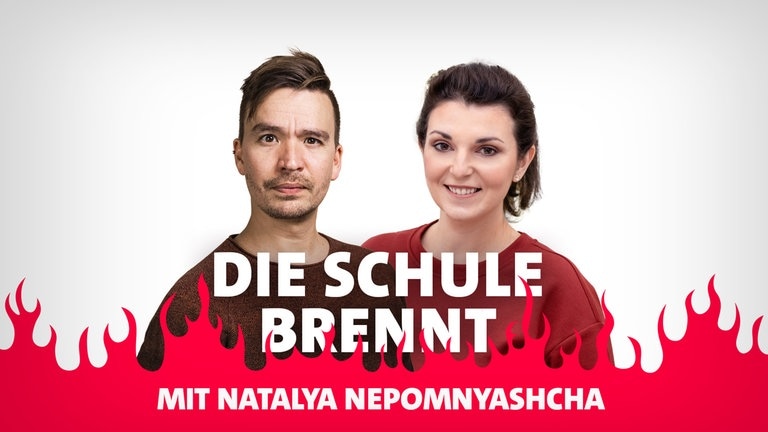 Bob Blume und Natalya Nepomnyashcha vor Flammen