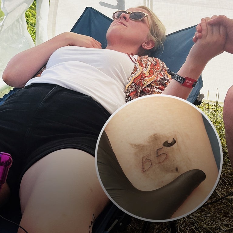 Eine junge Frau lässt sich die Nummer ihres Campingplatzes bei Rock am Ring auf den Oberschenkel tätowieren (Foto: SWR3, SWR3 / Yannick Mai)