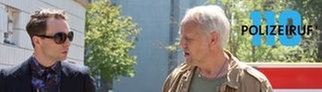 Zwei Männer unterhalten sich
