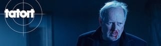 Szenenbild aus dem Tatort „Borowski und die Angst der weißen Männer“ mit Tatort-Logo
