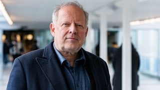 Der Schauspieler Axel Milberg bei Dreharbeiten zu seinem letzten ARD-Tatort in der Rolle des Kommissar Borowski. (Foto: picture-alliance / Reportdienste, Picture Alliance) Der Schauspieler Axel Milberg bei Dreharbeiten zu seinem letzten ARD-Tatort in der Rolle des Kommissar Borowski.